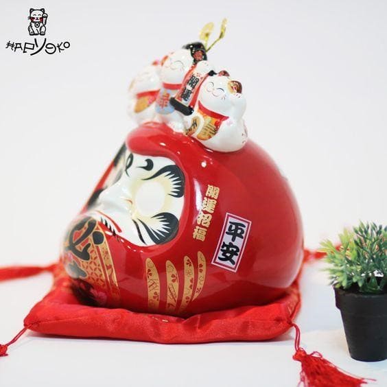 Chú mèo thần tài Daruma tới từ nền văn hóa Nhật Bản